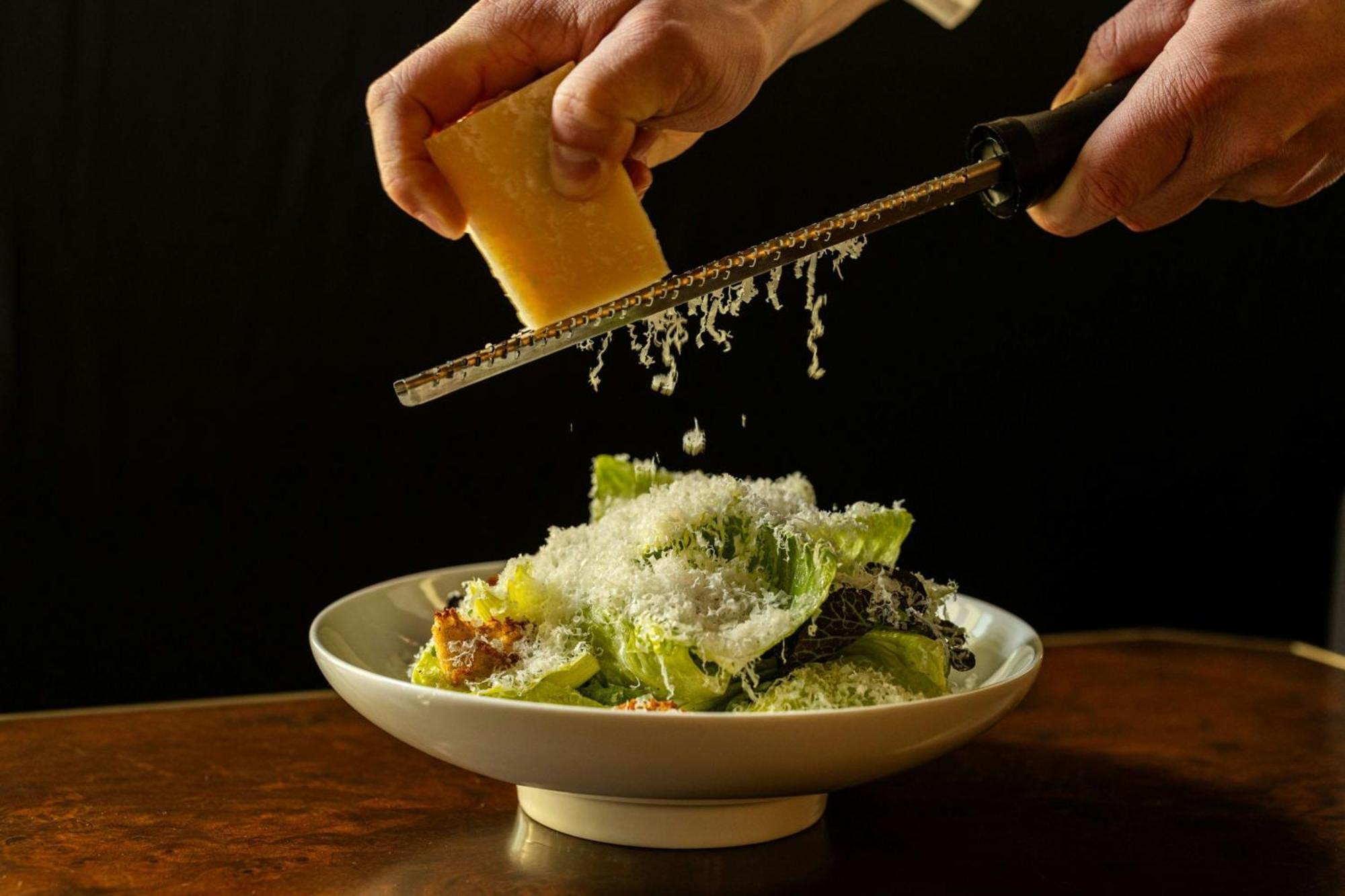Hotel New York Marriott Marquis Esterno foto Parmesan cheese being grated over a salad